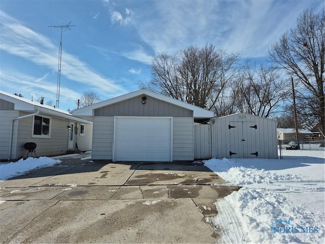 view of snow covered garage