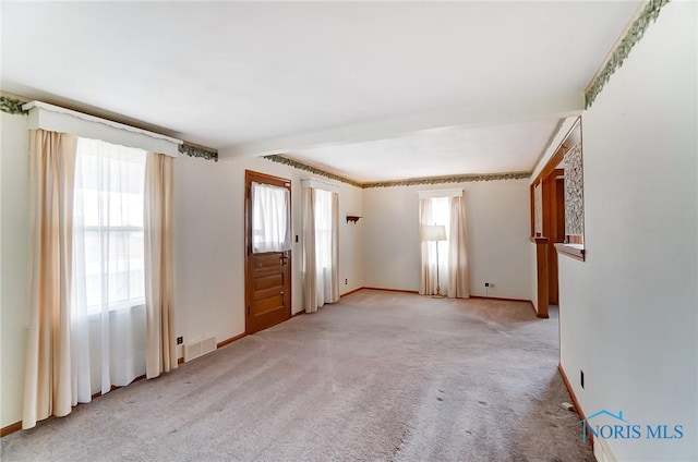 view of carpeted spare room