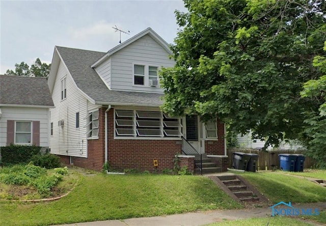 view of front of home with a front lawn