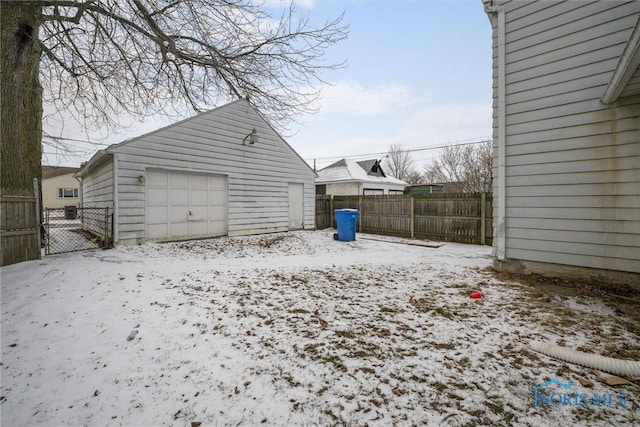 view of snow covered garage