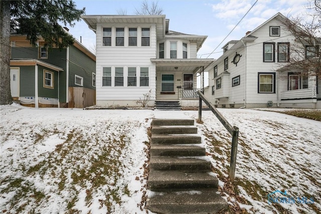 view of front of home featuring covered porch