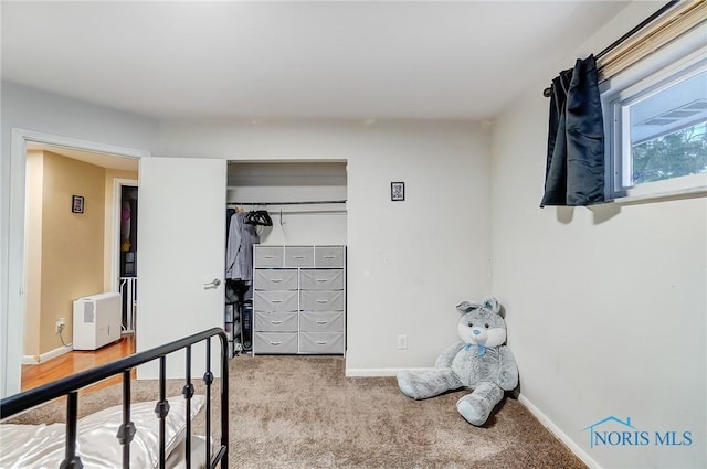 4811 Larkhaven Dr, Toledo, OH 43623 - unfurnished bedroom featuring carpet floors, a closet, and baseboards