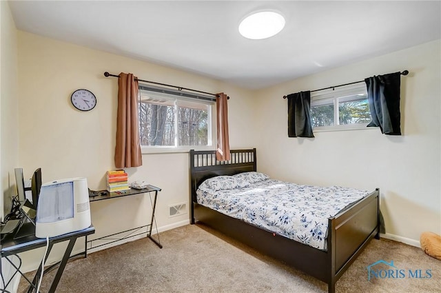 4811 Larkhaven Dr, Toledo, OH 43623 - carpeted bedroom featuring baseboards