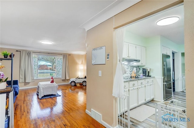 4811 Larkhaven Dr, Toledo, OH 43623 - exercise area featuring light wood-type flooring and baseboards