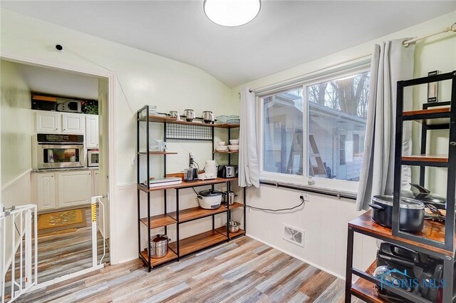 4811 Larkhaven Dr, Toledo, OH 43623 - misc room featuring lofted ceiling and light wood-style floors