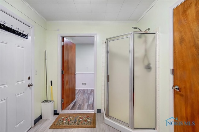 4811 Larkhaven Dr, Toledo, OH 43623 - full bath with wood finished floors, ornamental molding, and a stall shower