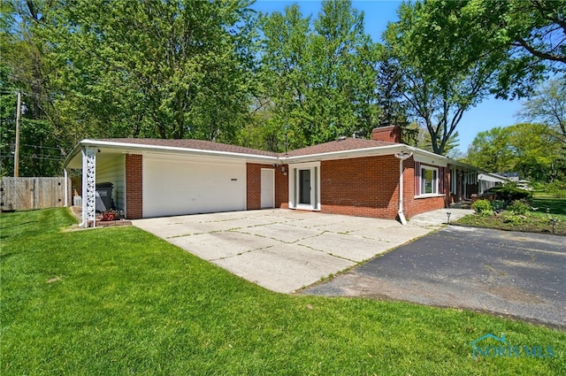 4811 Larkhaven Dr, Toledo, OH 43623 - ranch-style house with concrete driveway, brick siding, a garage, and a chimney