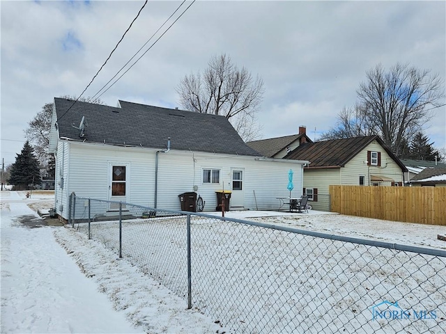 view of snow covered property