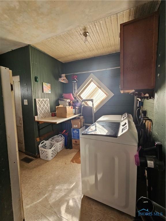 washroom featuring cabinets and wooden ceiling