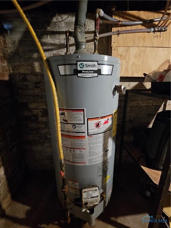 utility room with water heater