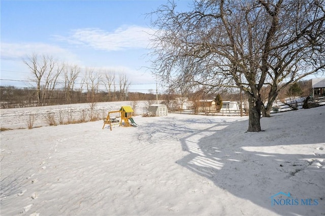 view of yard covered in snow