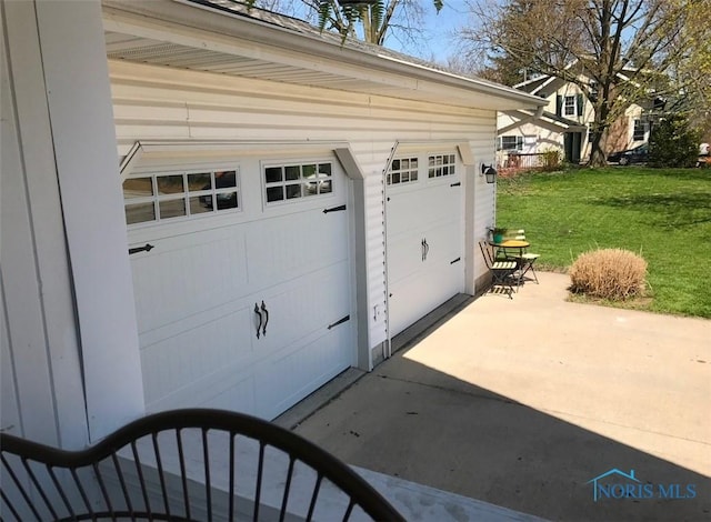 garage featuring driveway