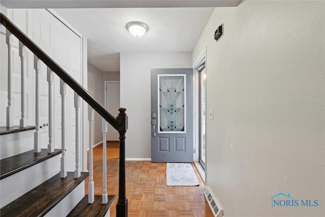 foyer featuring light parquet floors