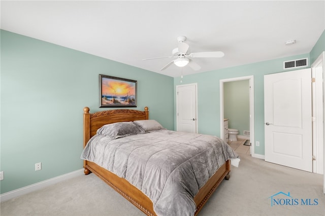 bedroom featuring light carpet, baseboards, and visible vents