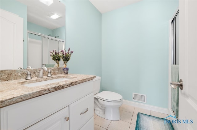 full bathroom with tile patterned floors, baseboards, vanity, toilet, and visible vents