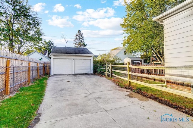 detached garage with fence