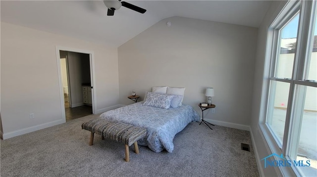 1244 Dublin Dr, Waterville, OH 43566 - bedroom featuring lofted ceiling, carpet floors, baseboards, ceiling fan, and connected bathroom