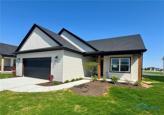 1244 Dublin Dr, Waterville, OH 43566 - modern farmhouse with a garage, a shingled roof, driveway, and a front lawn