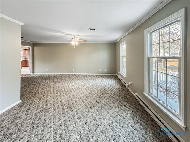 carpeted spare room featuring ornamental molding, baseboards, visible vents, and baseboard heating