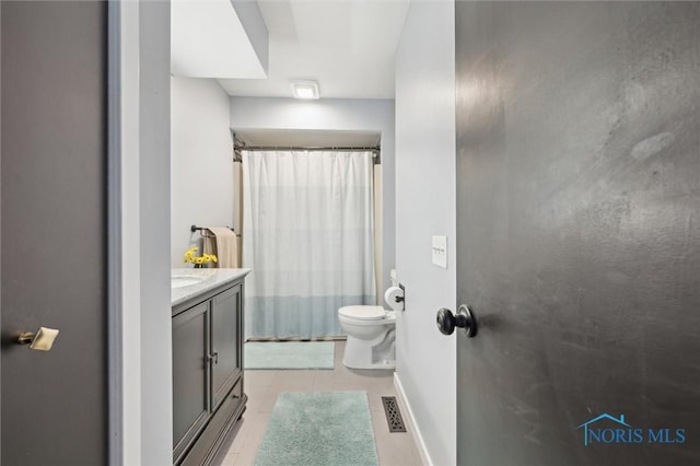 full bathroom with a shower with curtain, tile patterned flooring, visible vents, and vanity