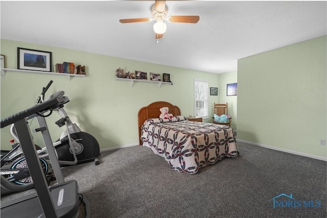 carpeted bedroom with a ceiling fan and baseboards