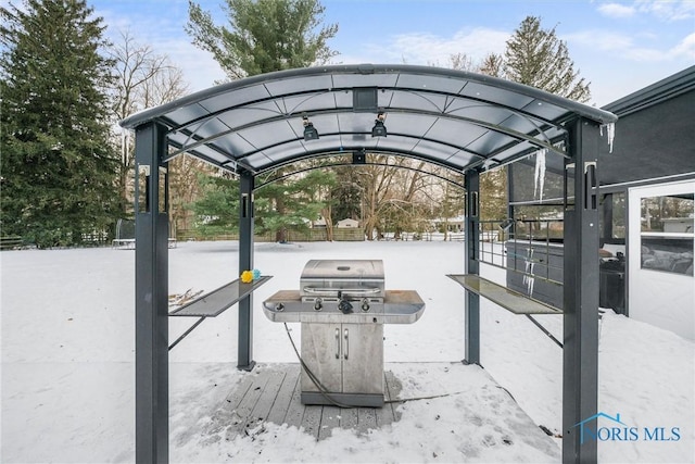 exterior space with grilling area and a gazebo