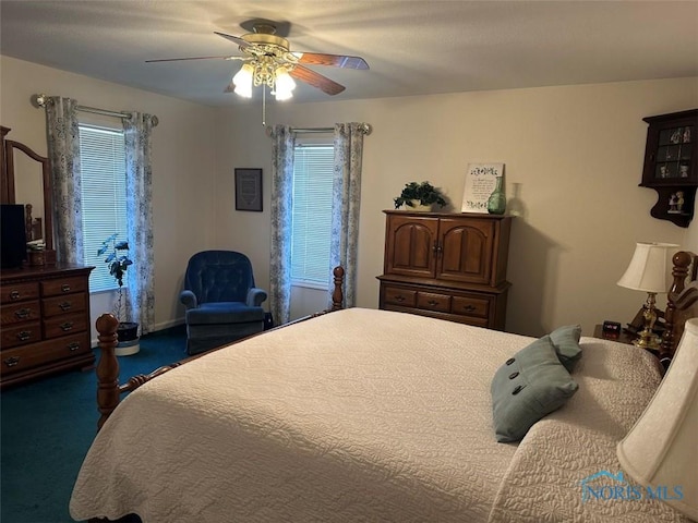 bedroom featuring carpet and a ceiling fan