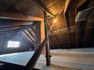 view of unfinished attic