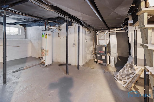 basement featuring heating unit and gas water heater