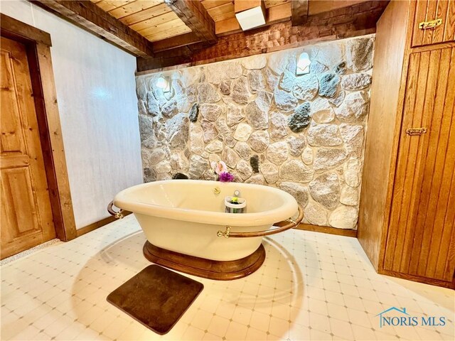3190 Rd 204, Antwerp, OH 45813 - full bathroom with a wooden ceiling with exposed beams, a freestanding tub, and wood walls
