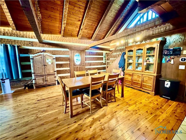 3190 Rd 204, Antwerp, OH 45813 - dining room with wooden ceiling, wooden walls, light wood finished floors, and stairs