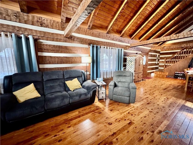 3190 Rd 204, Antwerp, OH 45813 - living area featuring wood-type flooring, wooden ceiling, wooden walls, and healthy amount of natural light