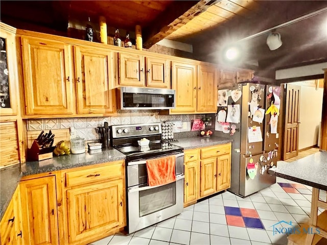 3190 Rd 204, Antwerp, OH 45813 - kitchen with appliances with stainless steel finishes, light tile patterned flooring, backsplash, a wood ceiling with exposed beams, and dark countertops