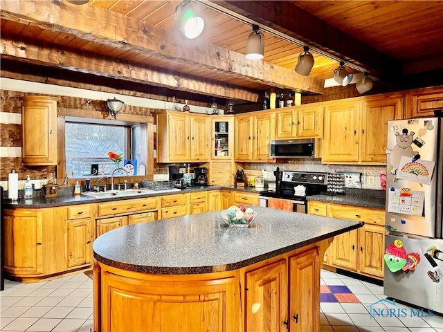 3190 Rd 204, Antwerp, OH 45813 - kitchen with stainless steel appliances, a wood ceiling with exposed beams, light tile patterned floors, dark countertops, and backsplash