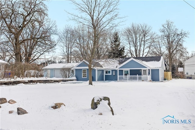 ranch-style home featuring covered porch