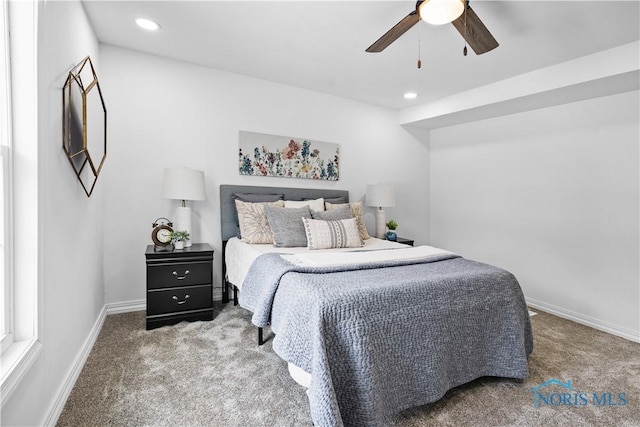 carpeted bedroom with a ceiling fan, recessed lighting, and baseboards