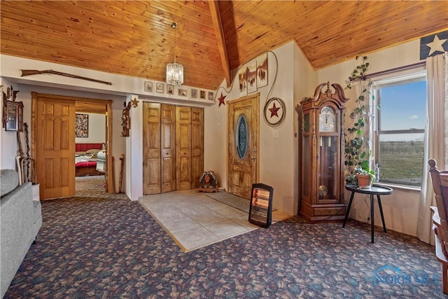 interior space featuring lofted ceiling, carpet floors, and wooden ceiling