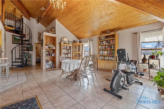 dining area with a notable chandelier, wood ceiling, light tile patterned floors, and beamed ceiling