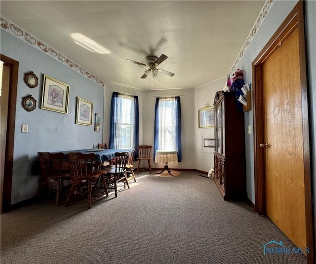 interior space with ceiling fan and carpet flooring