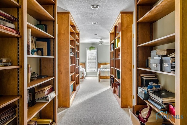 interior space featuring a ceiling fan