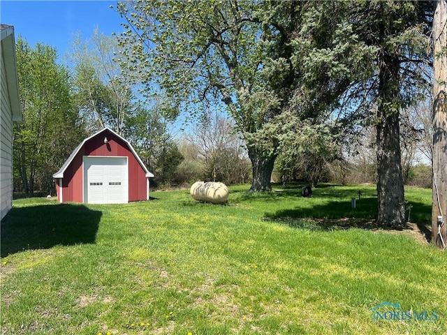 17020 State Route 2, Wauseon, OH 43567 - view of yard with an outdoor structure and a garage
