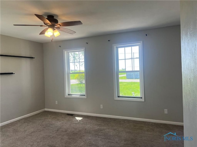17020 State Route 2, Wauseon, OH 43567 - unfurnished room featuring a ceiling fan, baseboards, visible vents, and carpet