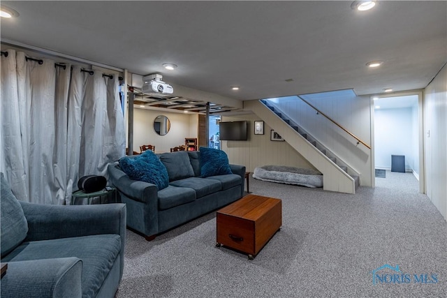 carpeted living room featuring recessed lighting and stairway