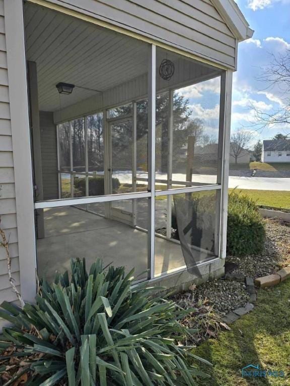 view of patio / terrace with a sunroom