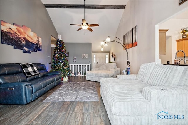 living room featuring high vaulted ceiling, a ceiling fan, and wood finished floors