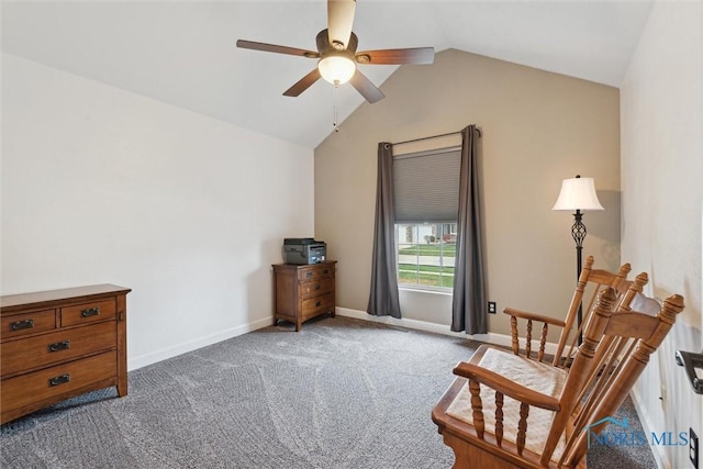 living area featuring carpet floors, ceiling fan, baseboards, and vaulted ceiling