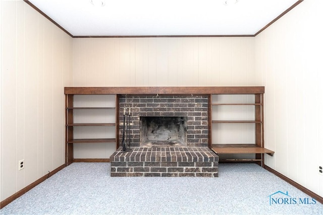 details with ornamental molding, carpet, a brick fireplace, and baseboards