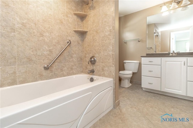 bathroom with toilet, shower / bathtub combination, vanity, and baseboards