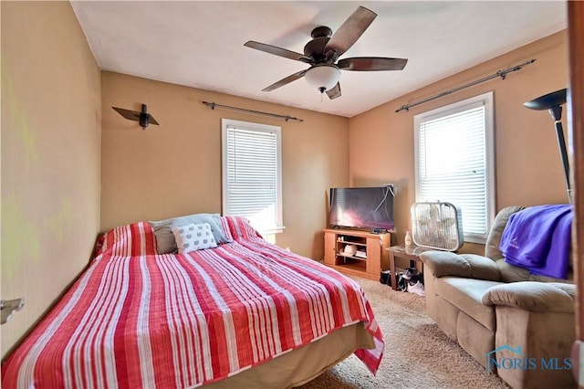 bedroom with carpet and ceiling fan