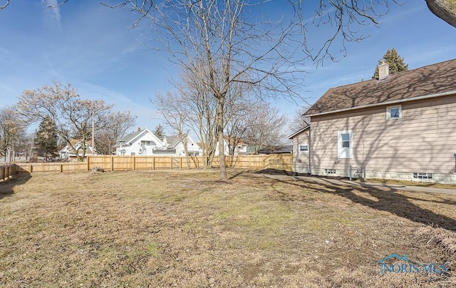 view of yard featuring fence